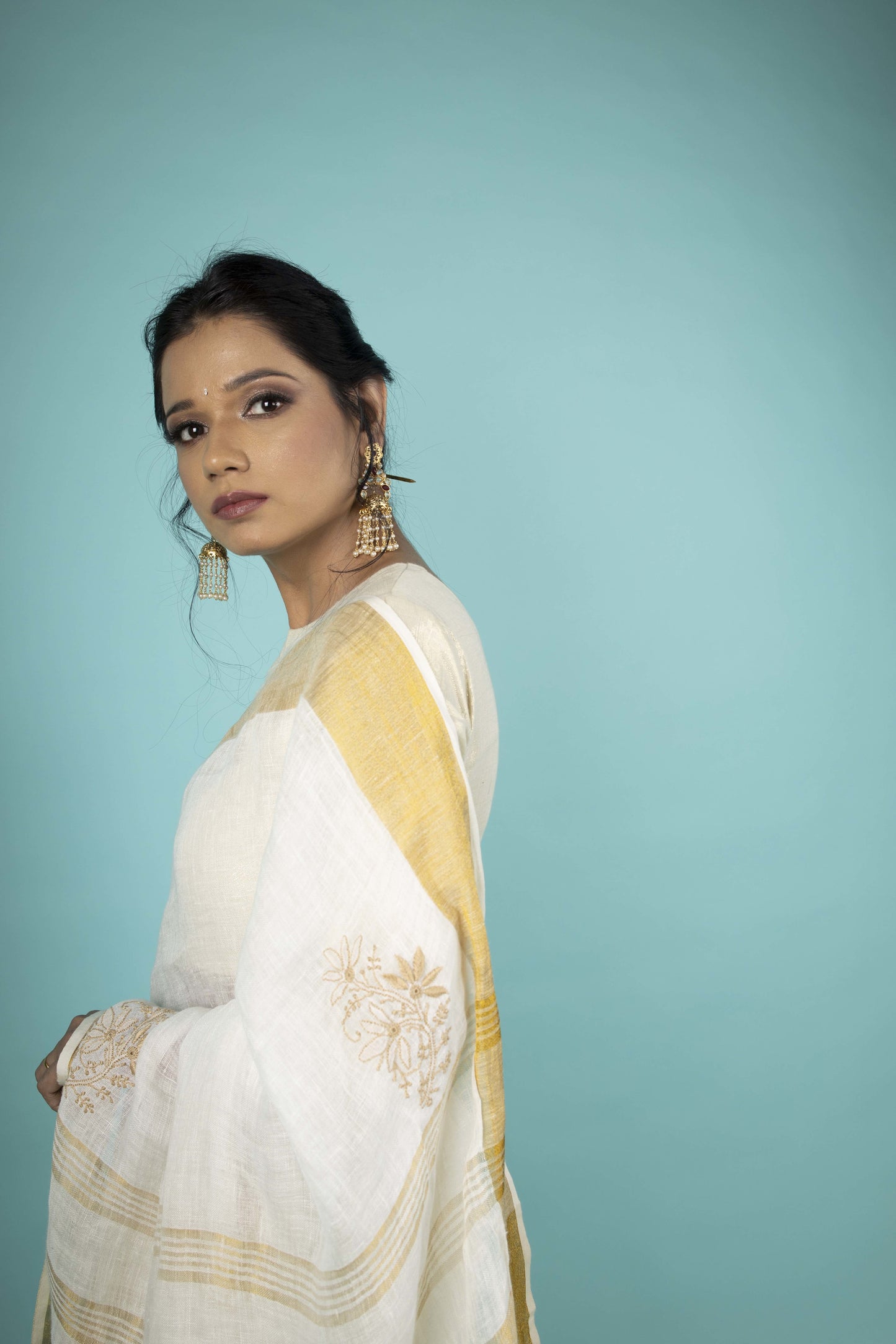 CREAM AND GOLDEN BORDER SAREE