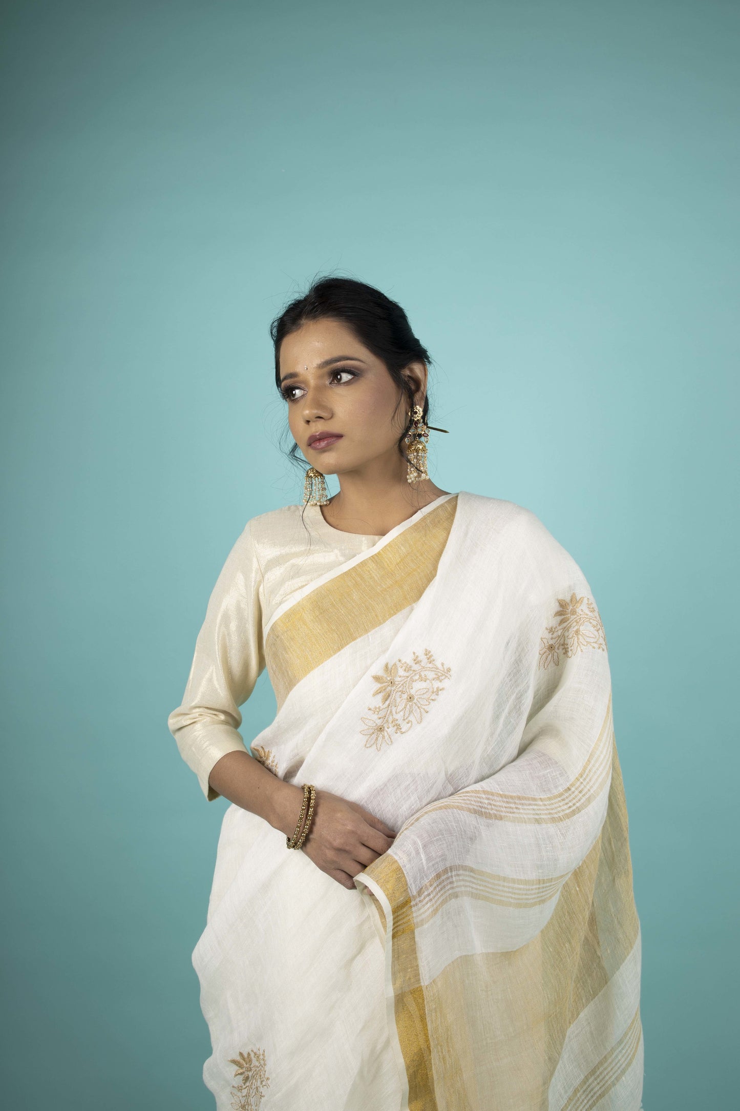 CREAM AND GOLDEN BORDER SAREE